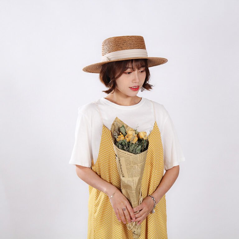The same flat-top wide-brimmed straw hat - Image 10